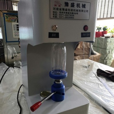 自动电动PET干果瓶封罐机 易拉罐饮料封罐机 柠檬水果汁封口机 pet瓶封罐机图1