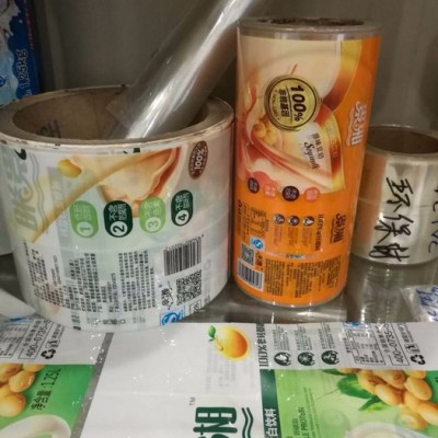 果汁果冻汽水酸奶饮料罐头PET环保热收缩膜彩印商标pvc热缩机器自动套膜标签 PET环保热收缩膜彩标厂家图1