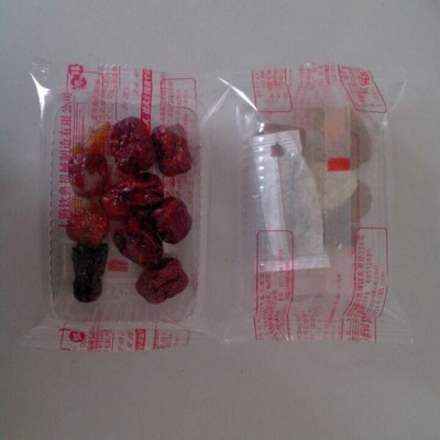 QD-250小橘子橡皮檫包装机方形糖果自动包装机橡胶手套包装设备脆柿子背封包装机图3