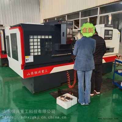 机械手自动上下料数控车床 恒兴牌双头数控机床图3